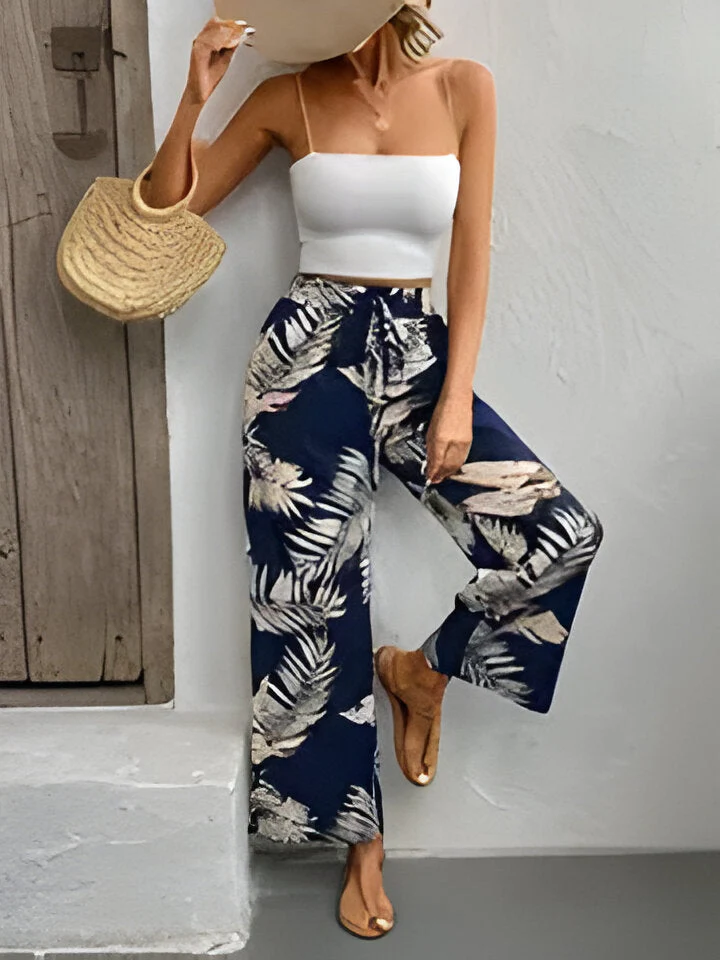 Camilla | Weit geschnittene Hose mit Blumendruck und Kordelzug - Image 2
