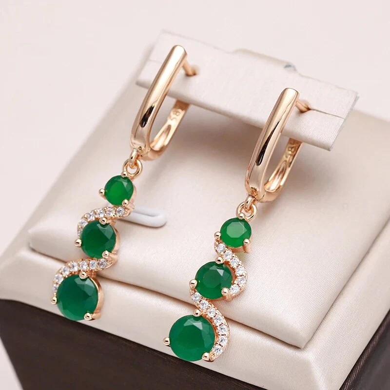 Elegante Ohrringe mit goldenem Zirkonia - Image 3
