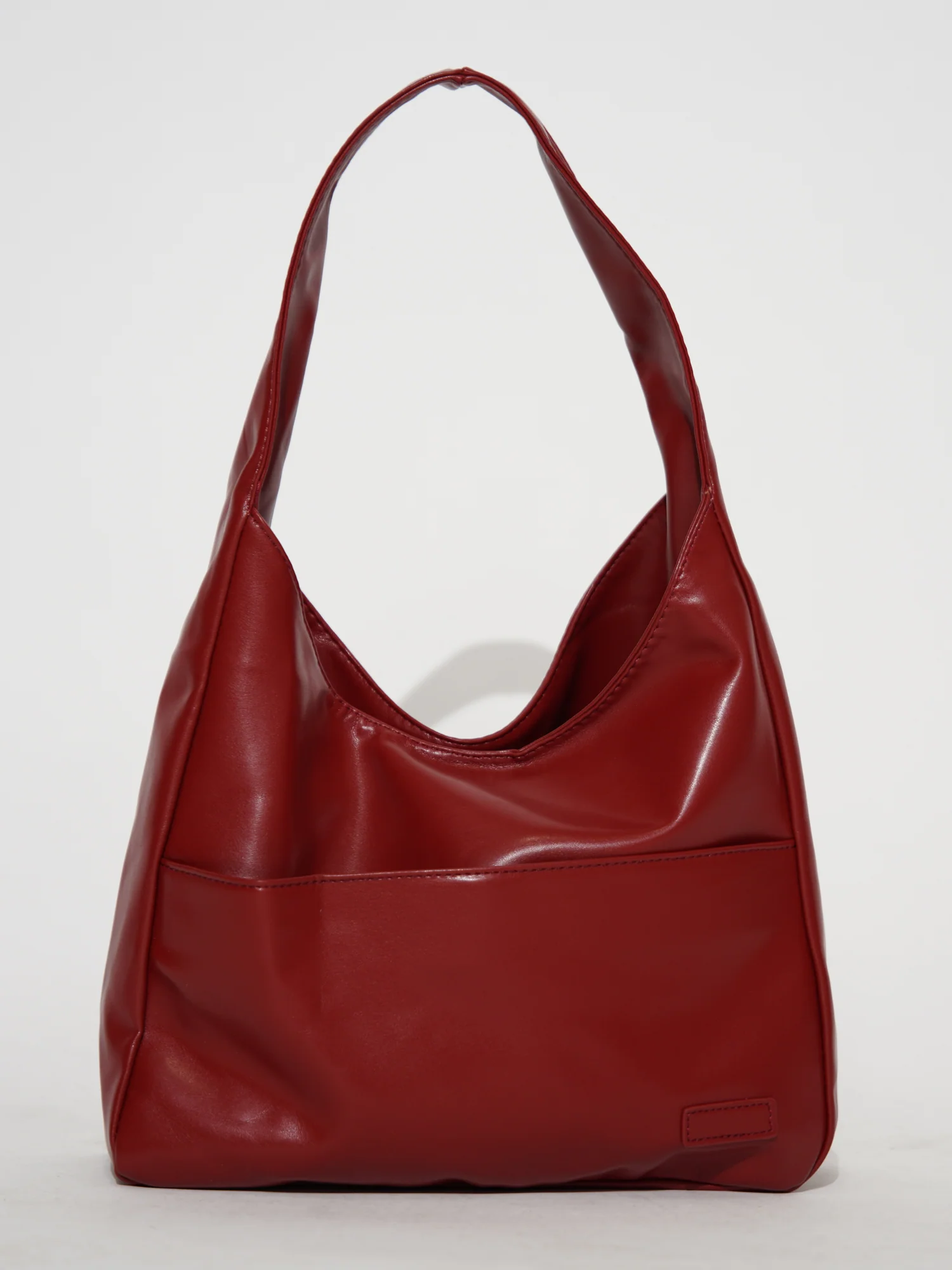 Elegante runde Schultertasche für Damen aus veganem Leder