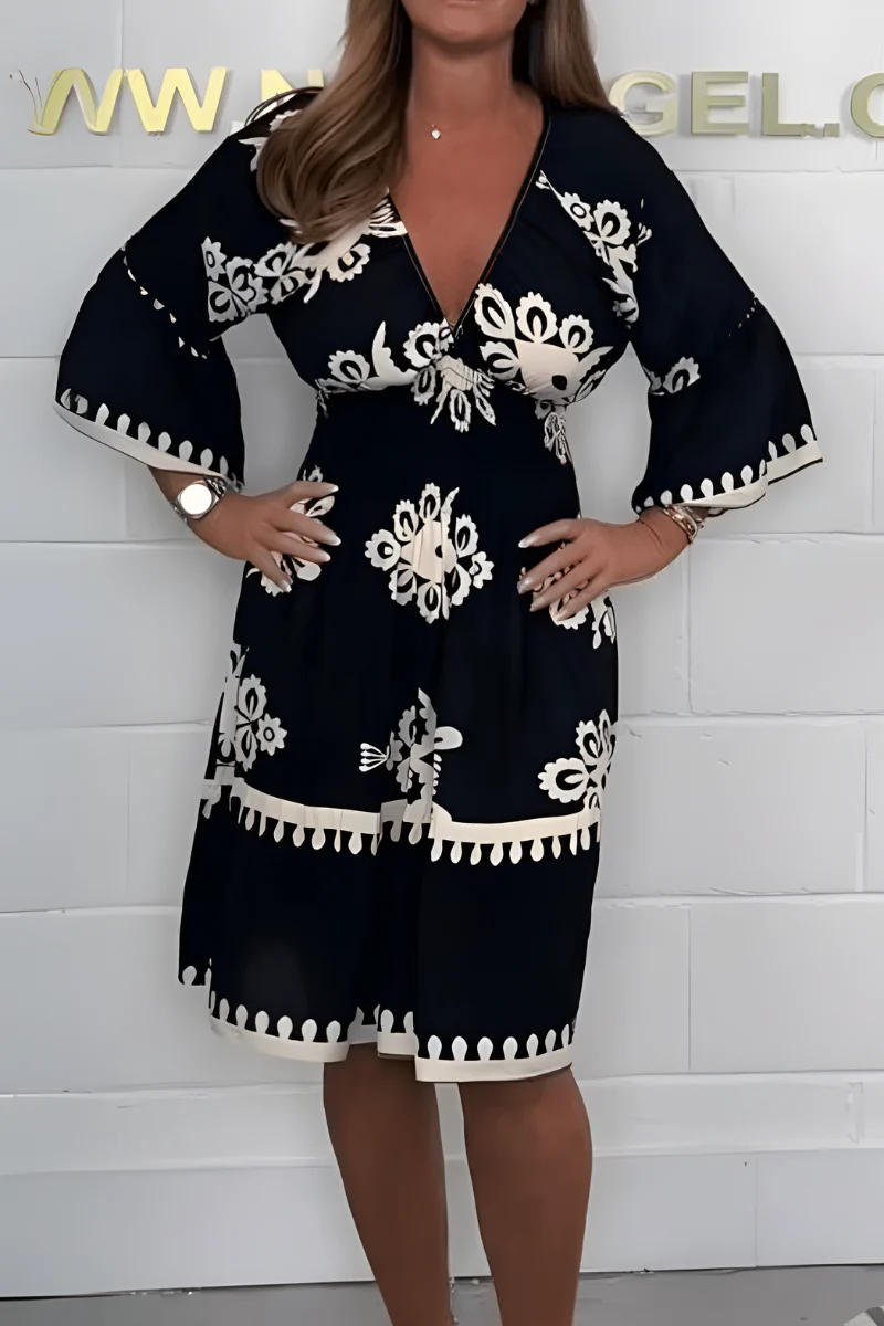 Elegantes Kleid mit Muster und V-Ausschnitt – perfekt für jeden Anlass