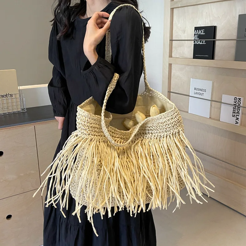 Geflochtene Tasche mit Fransen – Natürlicher und Boho-Stil - Image 4