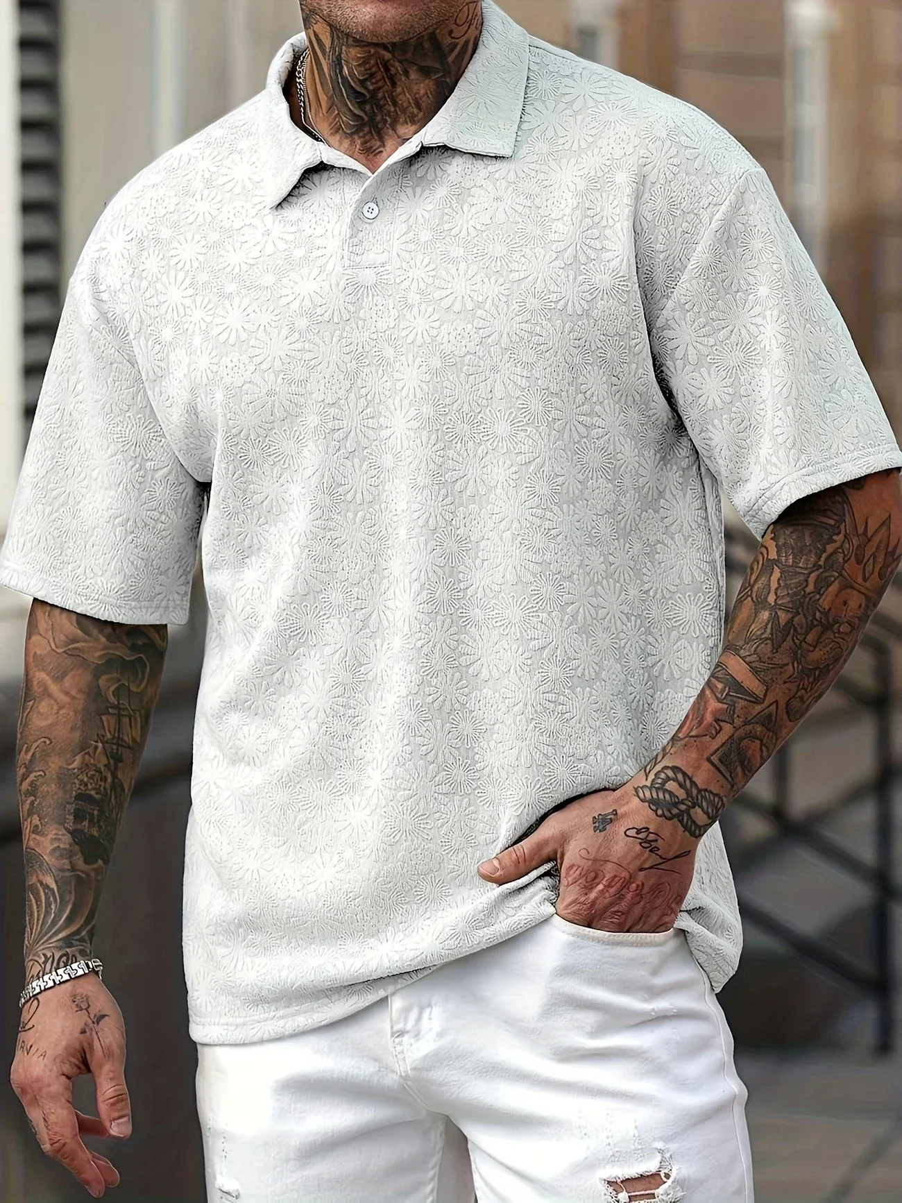 Jovan- Kurzärmliges Poloshirt mit Gänseblümchenstruktur für Herren - Image 3