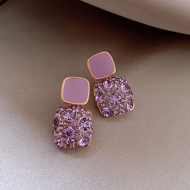 Luxuriöse lila Ohrringe mit Zirkonia-Inlay - Image 2