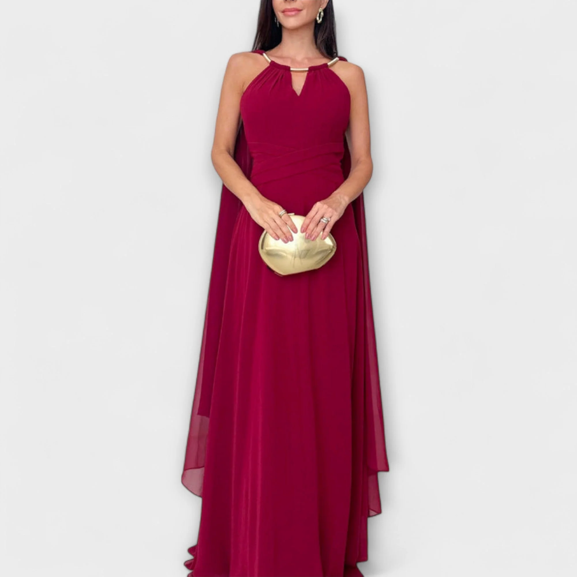 Mabel - Elegantes Maxikleid mit Cape-Ärmeln und hohem Schlitz" 

Rewritten: "Mabel - Stilvolles Maxikleid mit schwingenden Cape-Ärmeln und verführerischem Schlitz - Image 2