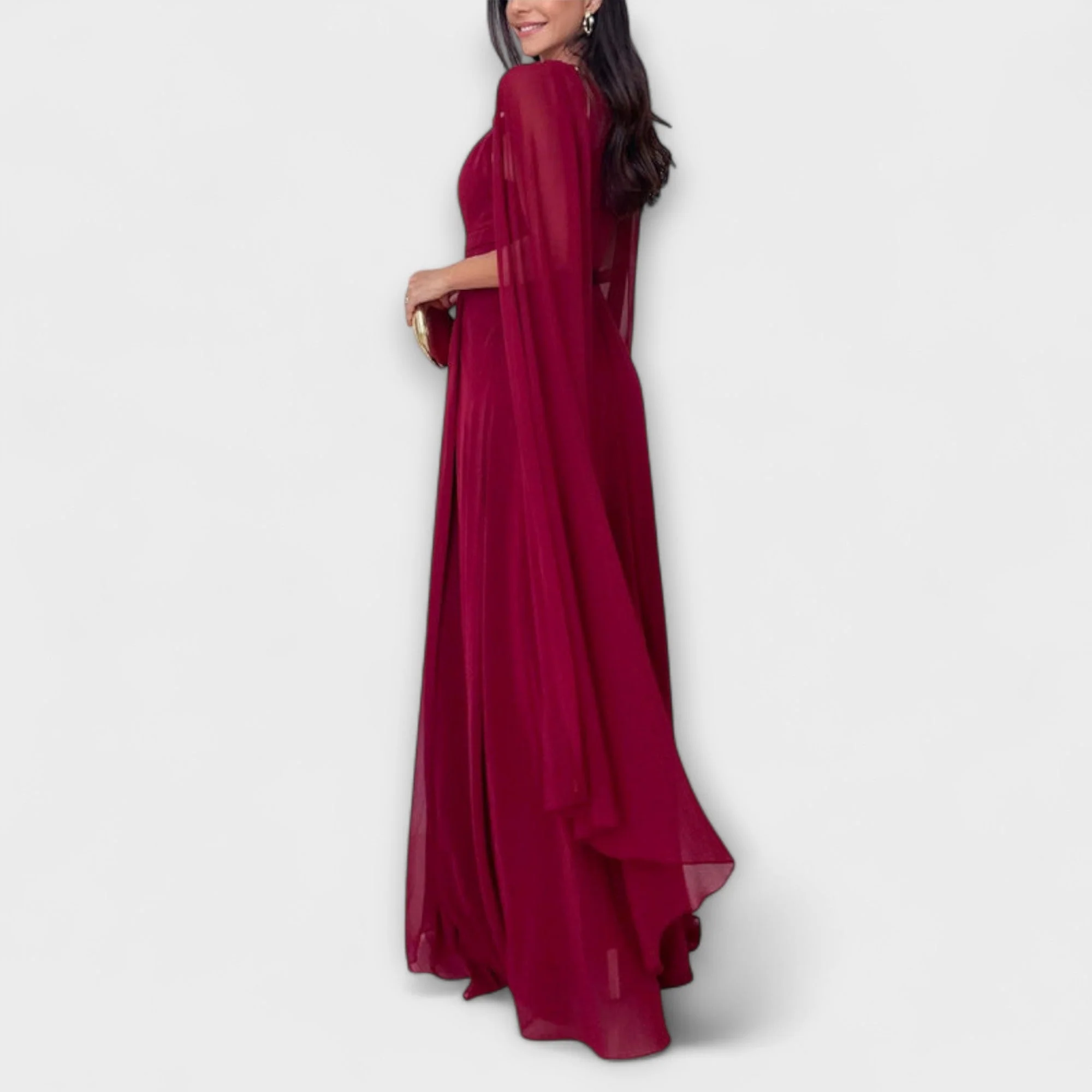 Mabel - Elegantes Maxikleid mit Cape-Ärmeln und hohem Schlitz" 

Rewritten: "Mabel - Stilvolles Maxikleid mit schwingenden Cape-Ärmeln und verführerischem Schlitz - Image 3