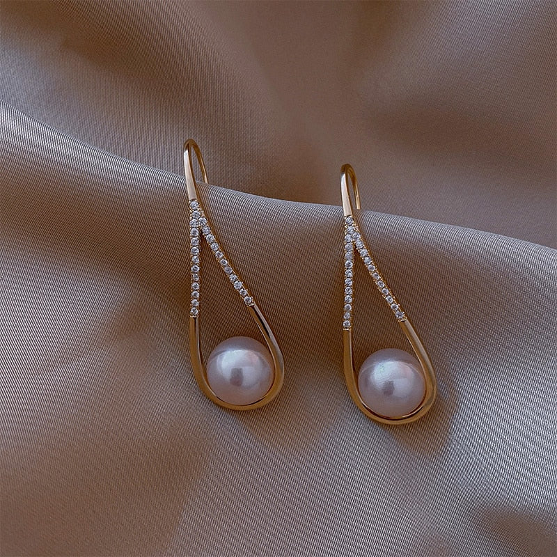 Perlenohrringe aus Roségold - Image 3