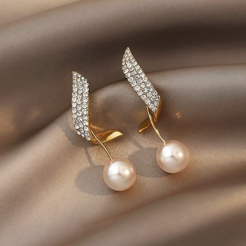 Perlenohrringe in Gold - Image 2