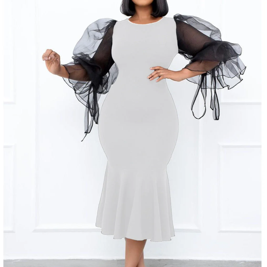 Urzula- Damen Abendkleid mit transparenten Puffärmeln und Saum - Image 2