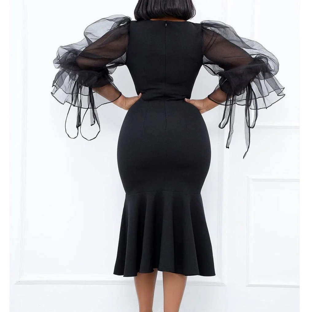 Urzula- Damen Abendkleid mit transparenten Puffärmeln und Saum - Image 3