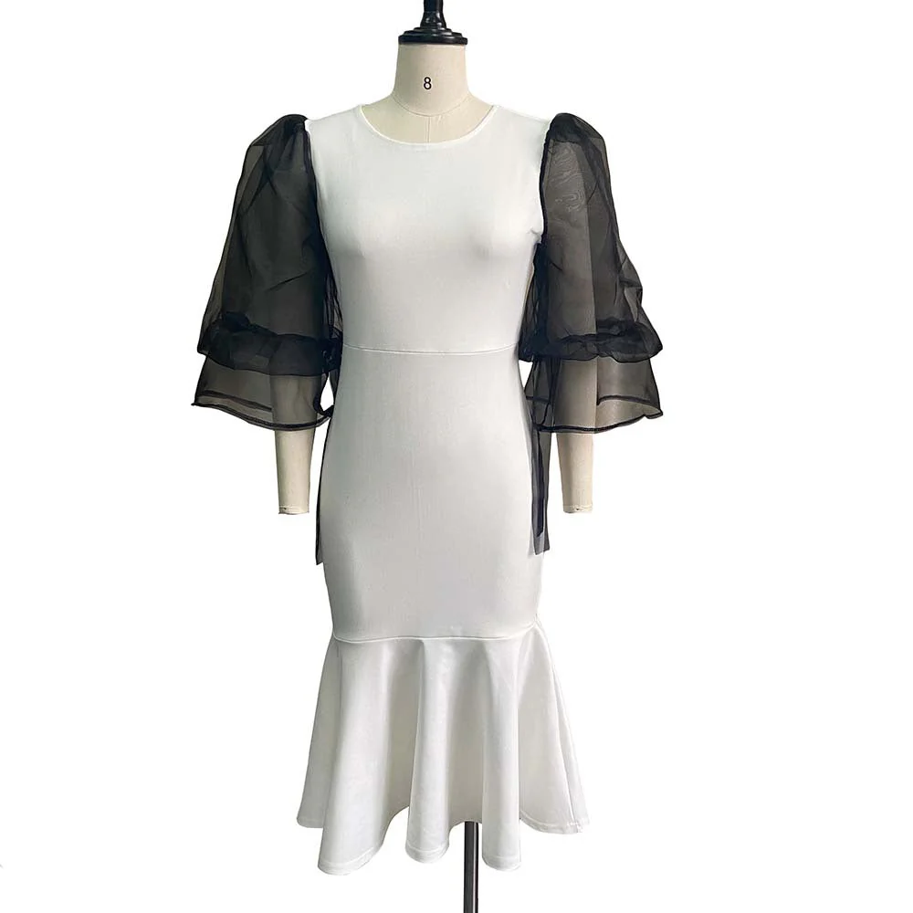Urzula- Damen Abendkleid mit transparenten Puffärmeln und Saum - Image 5