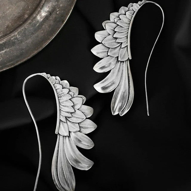 Vintage Geflügelte Ohrringe in Silber - Image 3