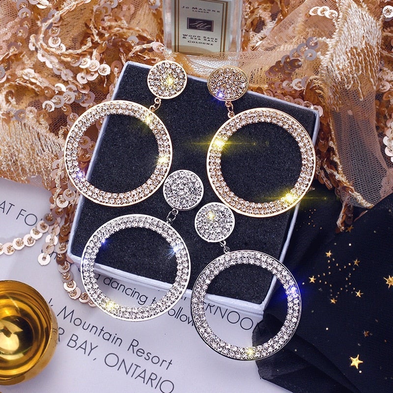 Zirkonia-Ohrringe in Gold und Silber - Image 3